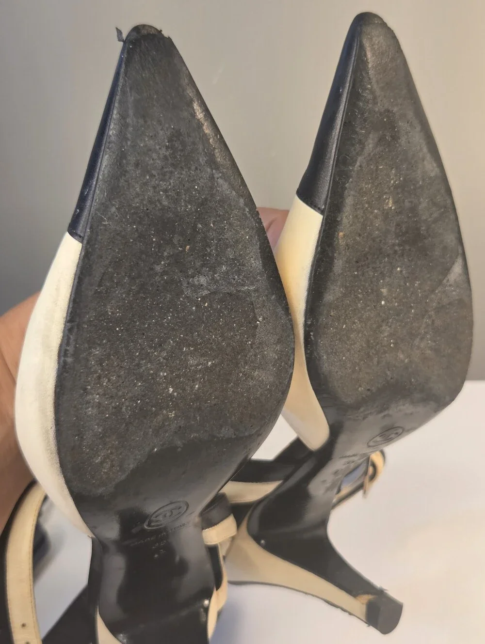 Chanel sling-back pumps feature a sophisticated pointed toe READ 35